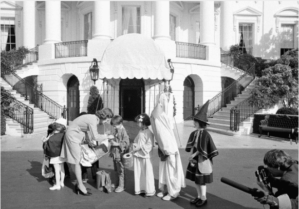 First Lady Betty Ford at a Halloween benefit.