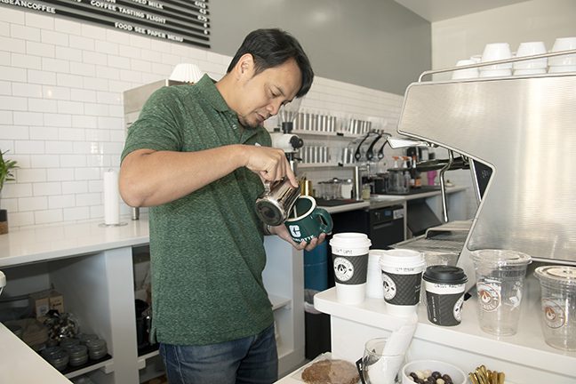 Vo making an espresso