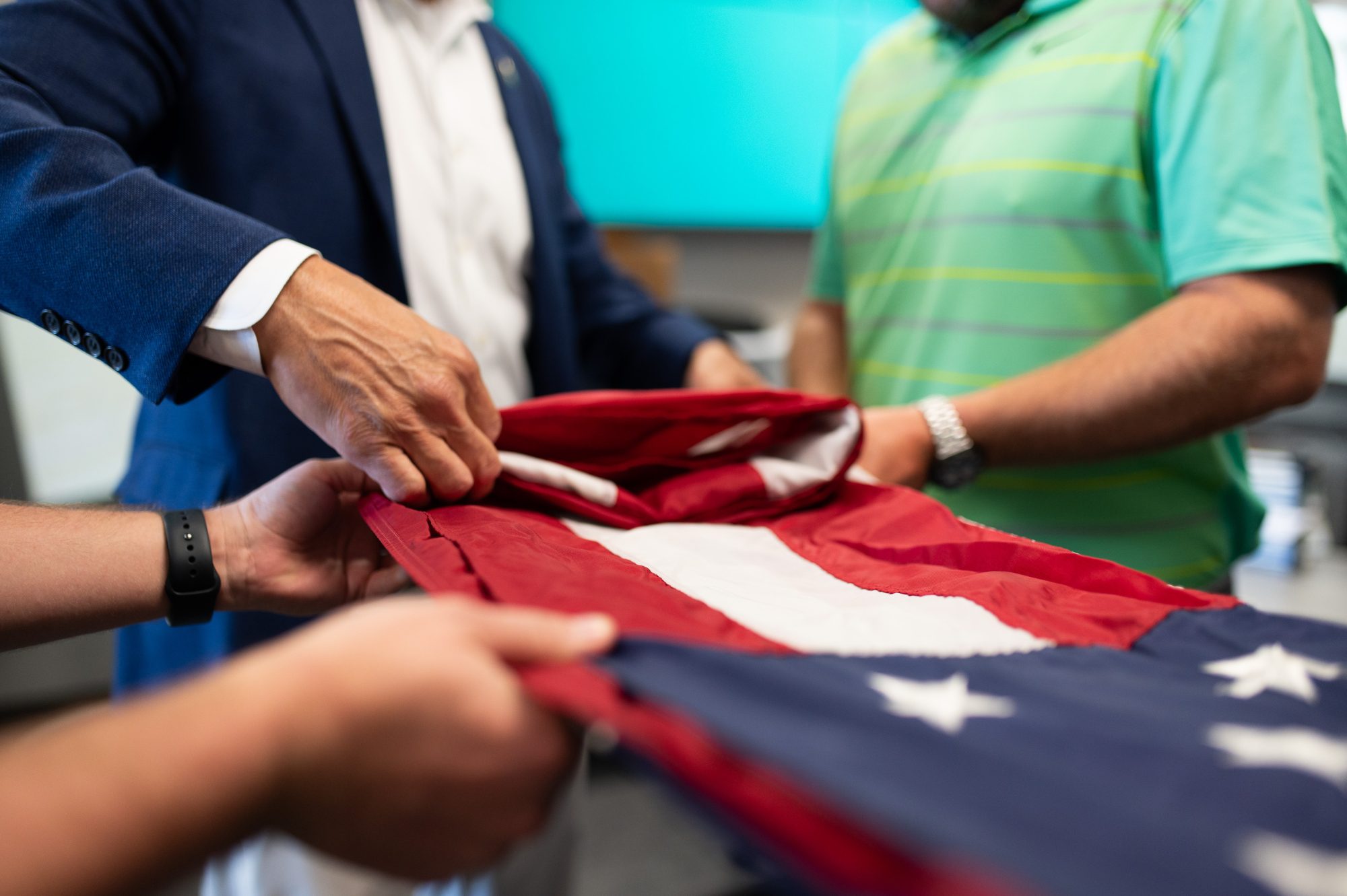 Folding the American flag.