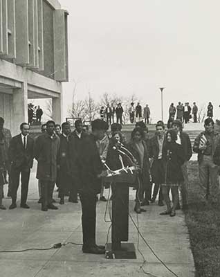 Chavis speaking outside admininstration building