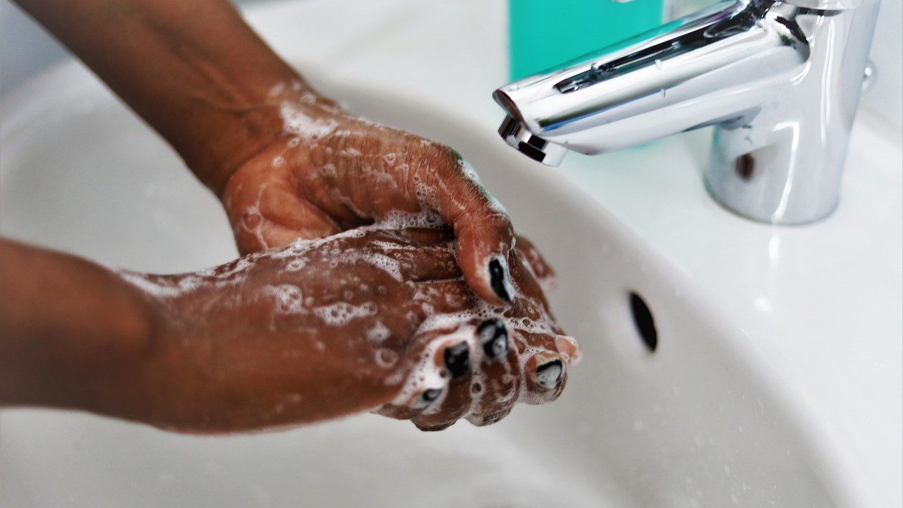 Photo of hands being washed