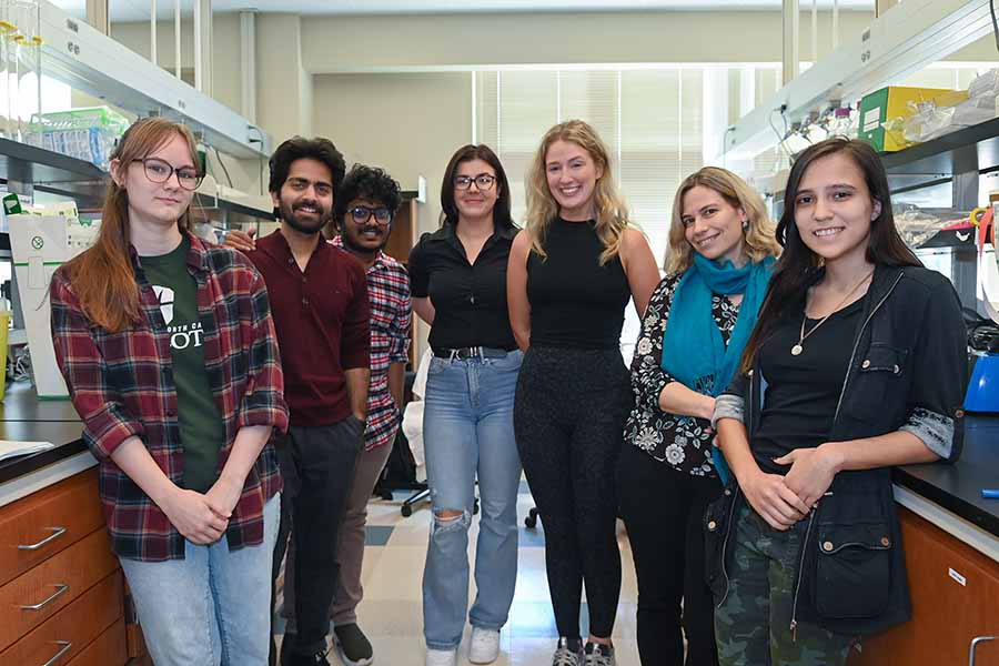 Researcher Patricija van Oosten-Hawle with members of her lab