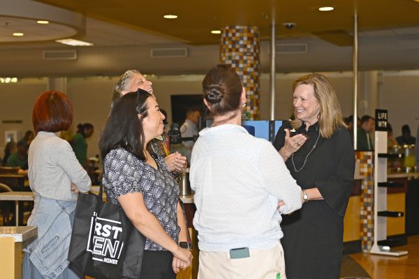 Chancellor Gaber talks with staff at the Chancellor's Staff Appreciation event